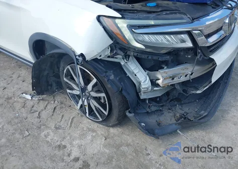 2019 Honda Pilot Touring z USA, uszkodzony, nr VIN 5FNYF5H9XKB001842